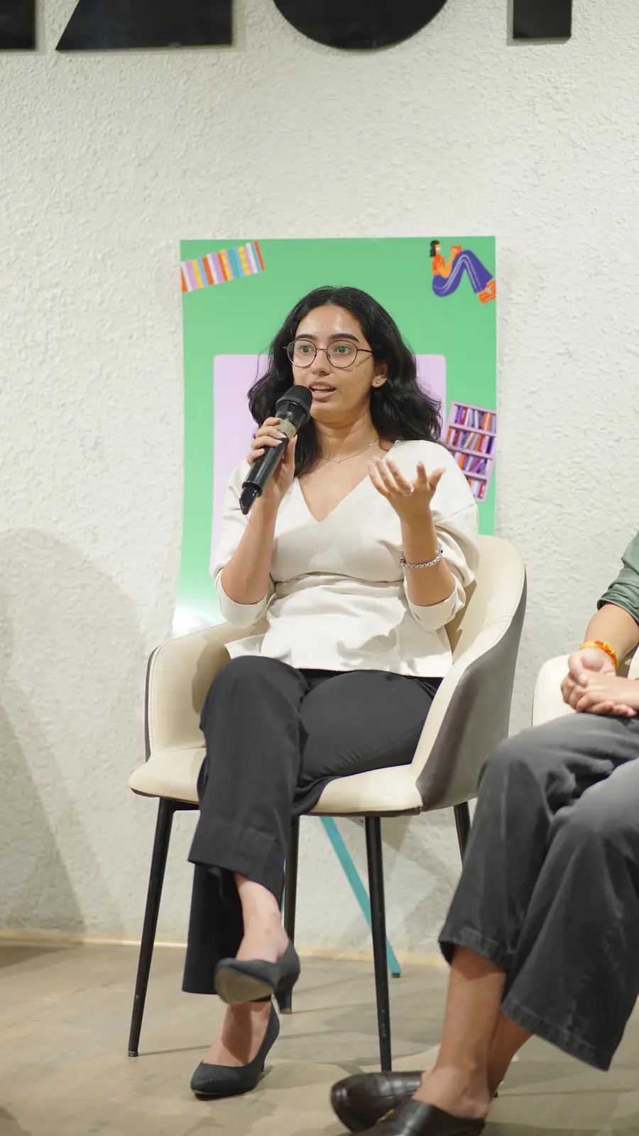 A creator speaking during a panel